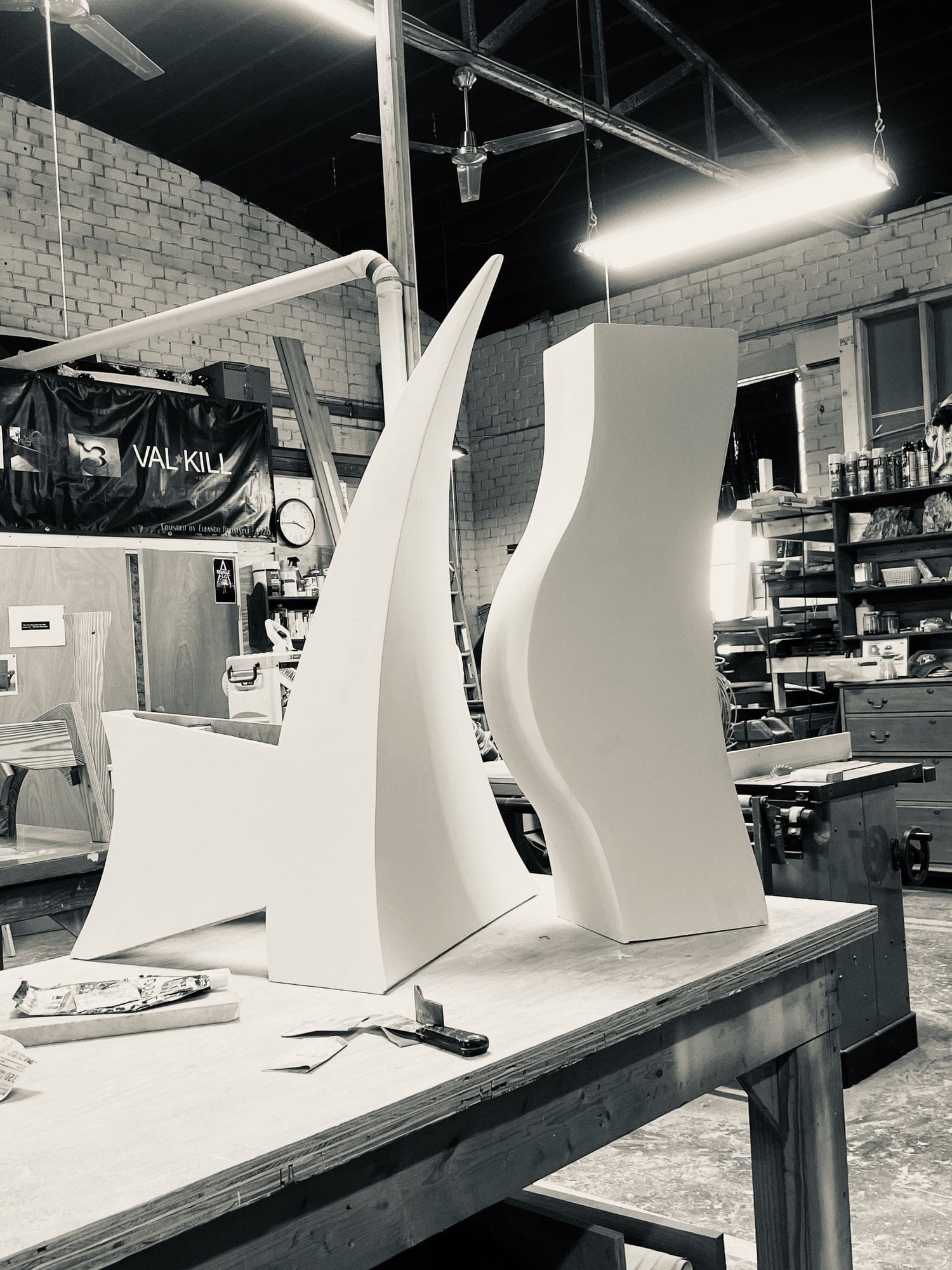 Tall white sculptural furniture forms in progress in Ric’s studio